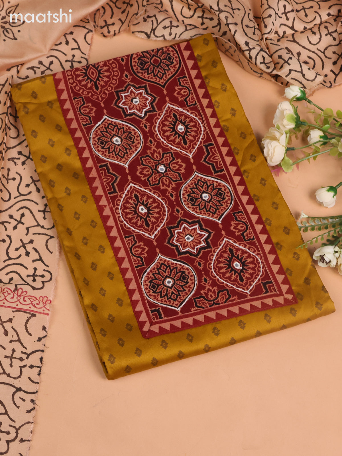 Cotton dress material dark mustard and maroon with allover buttas prints & ajrakh patch work neck pattern and bottom & dupatta