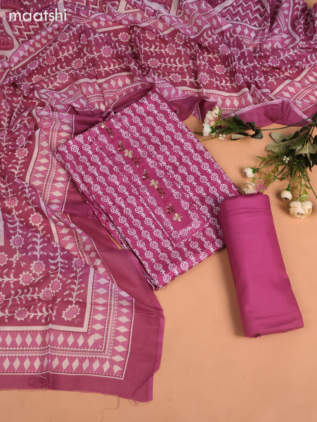 Cotton dress material pastel magenta and off white with allover batik prints & embroidery work neck pattern and bottom & dupatta