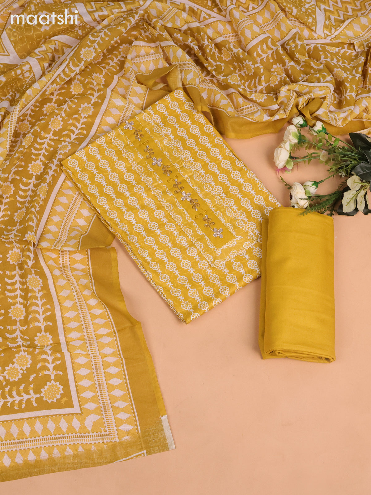 Cotton dress material yellow and off white with allover batik prints & embroidery work neck pattern and bottom & dupatta