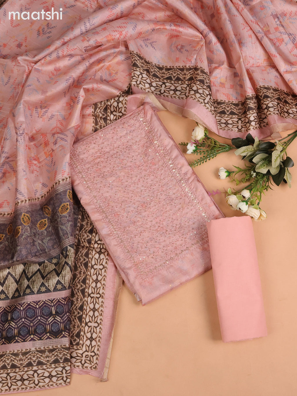 Semi tussar dress material peach shade with allover prints & sequin embroidery work neck pattern and bottom & dupatta
