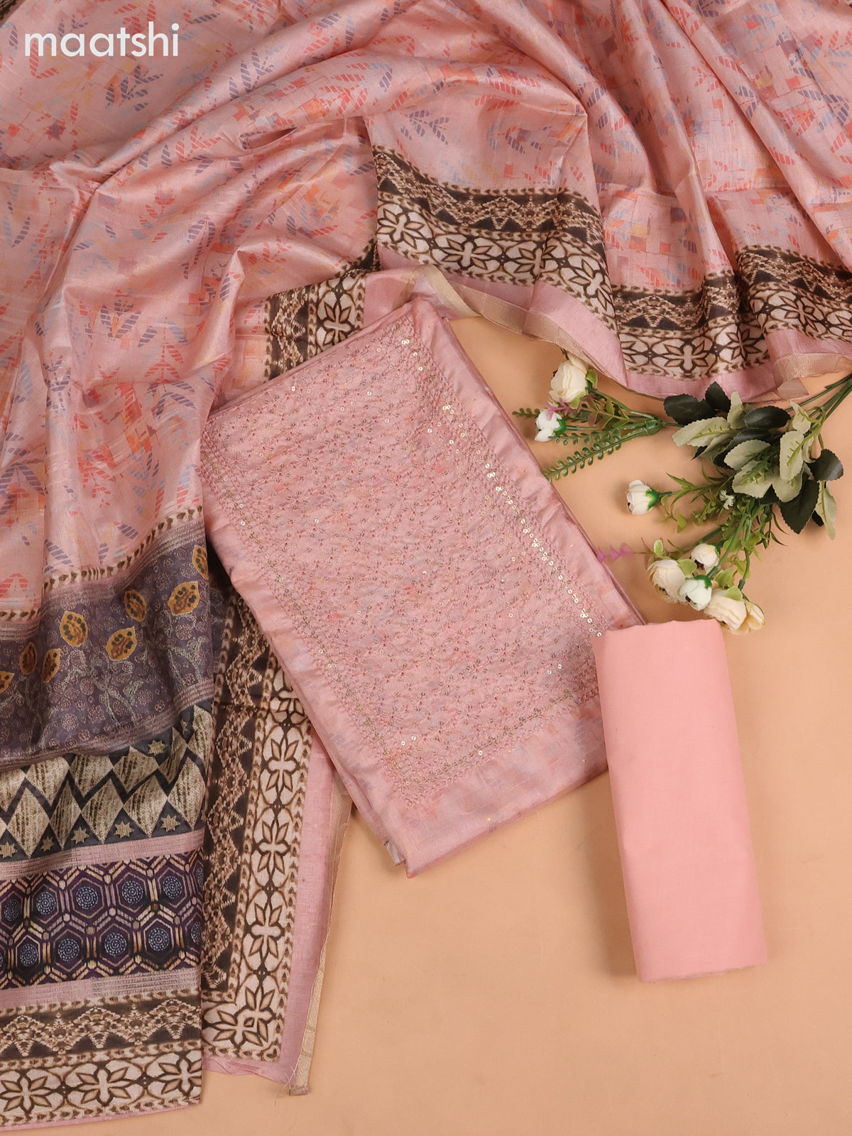 Semi tussar dress material peach shade with allover prints & sequin embroidery work neck pattern and bottom & dupatta