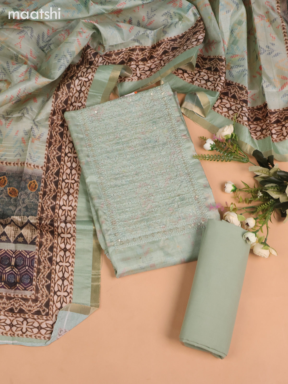 Semi tussar dress material teal shade with allover prints & sequin embroidery work neck pattern and bottom & dupatta