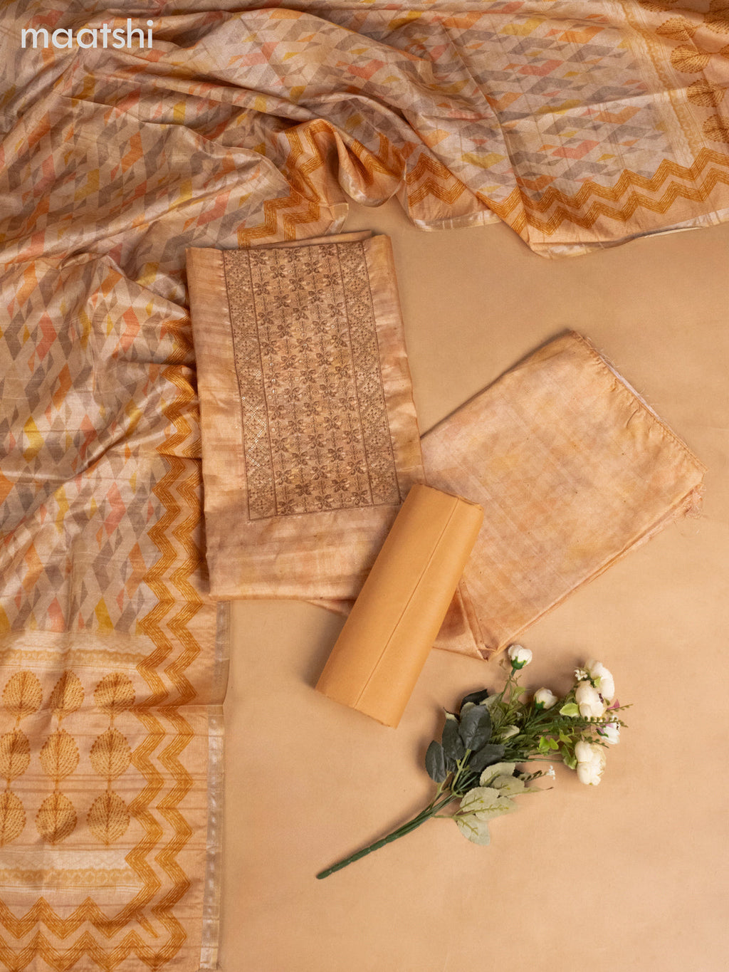 Semi tussar dress material pale orange with allover prints & sequin embroidery work neck pattern and bottom & dupatta