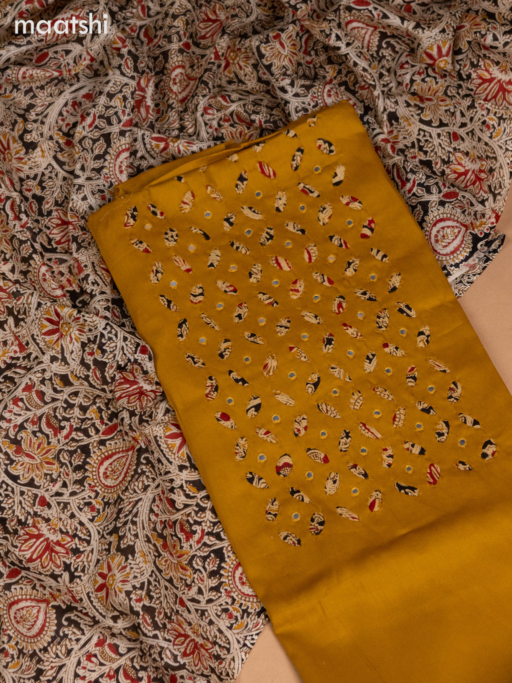 Cotton dress material mustard yellow with kalamkari prints & mirror work neck pattern and bottom & kalamkari dupatta