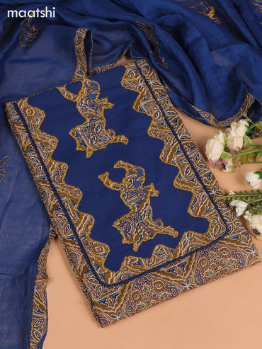 Cotton dress material dark mustard and blue with ajrakh prints & patch work neck pattern and bottom & embroidery dupatta