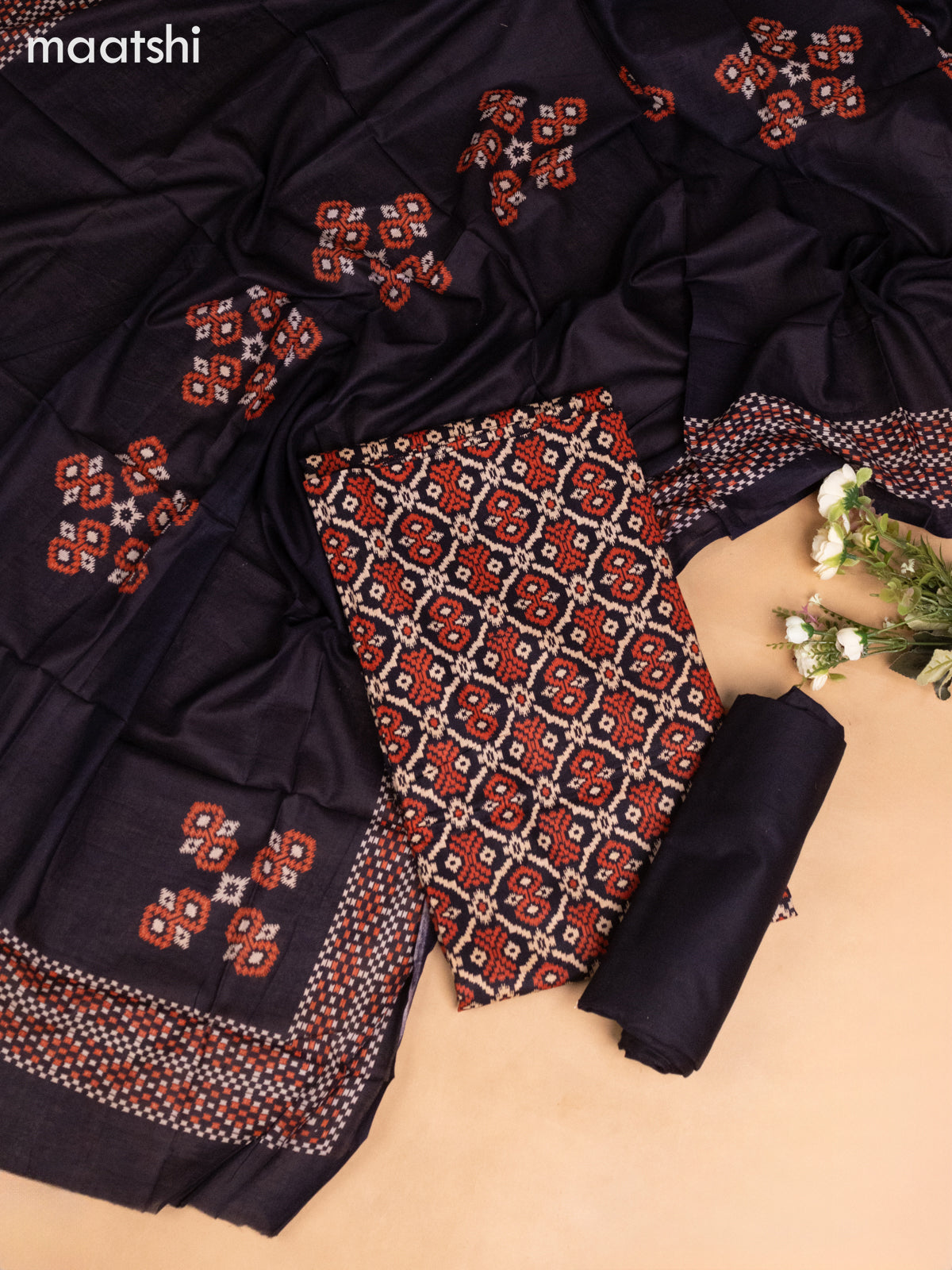 Cotton dress material black with allover ikat weaves and bottom & dupatta