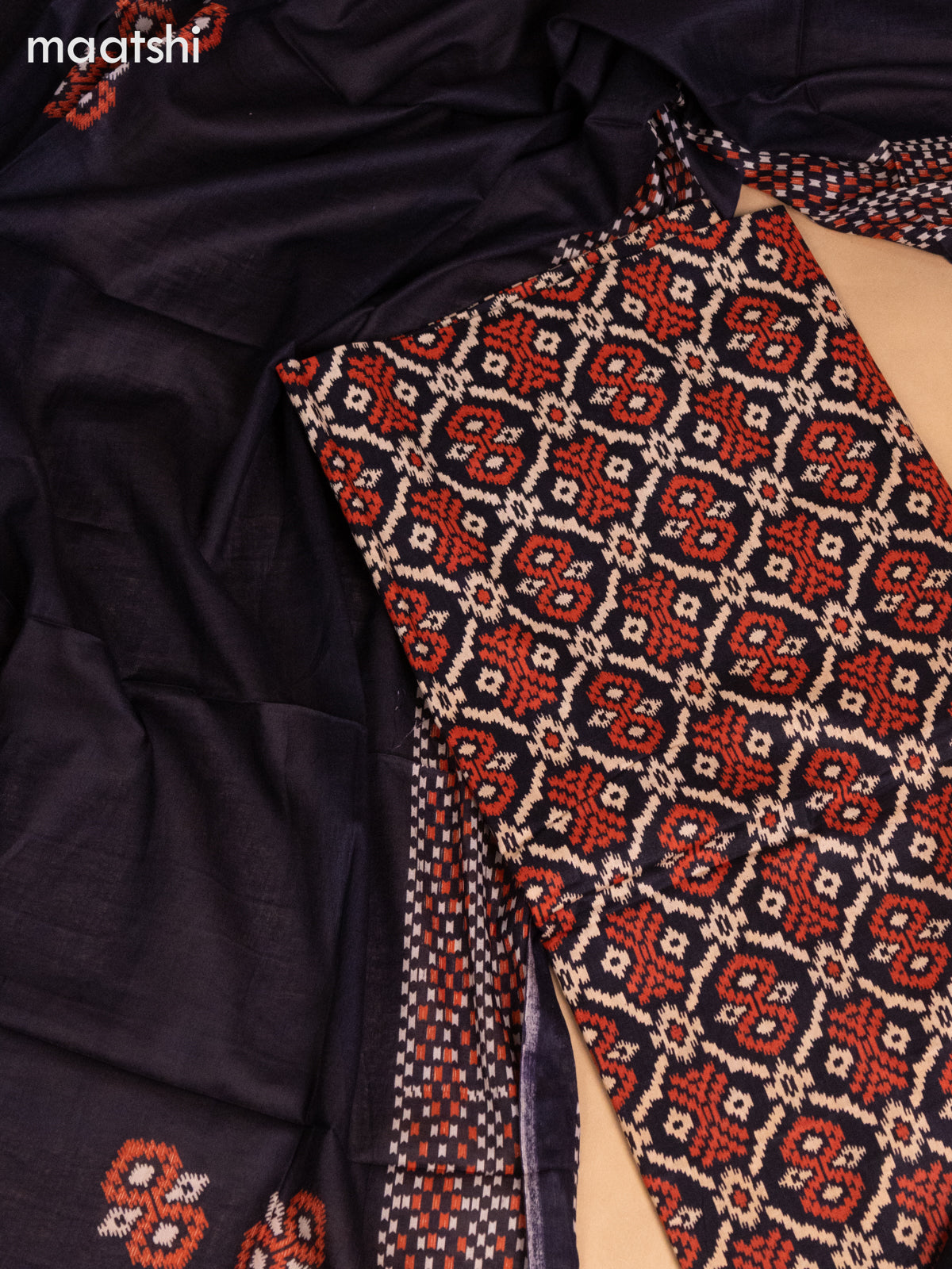Cotton dress material black with allover ikat weaves and bottom & dupatta