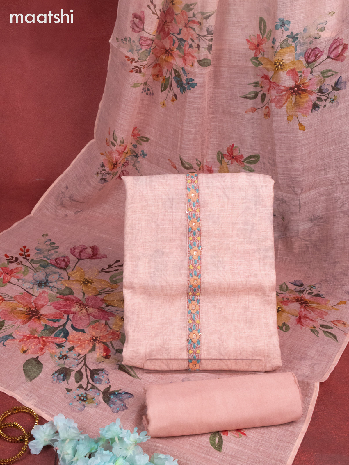 Linen dress material peach shade with allover prints & sequin embroidery work neck pattern and bottom & french knot dupatta