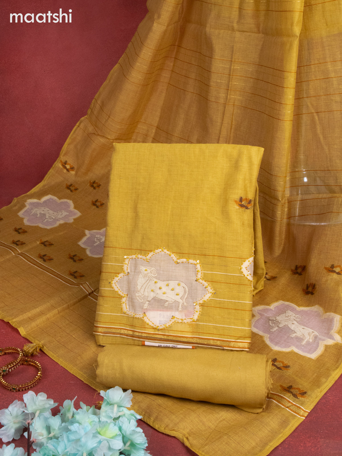 Munga cotton dress material mustard shade with woven buttas & pichwai prints french knot work and bottom & thread zari dupatta