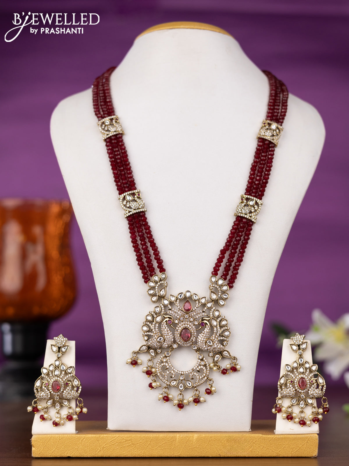 Beaded triple layer maroon necklace peacock design with kundan & cz stones and pearl & beads hangings