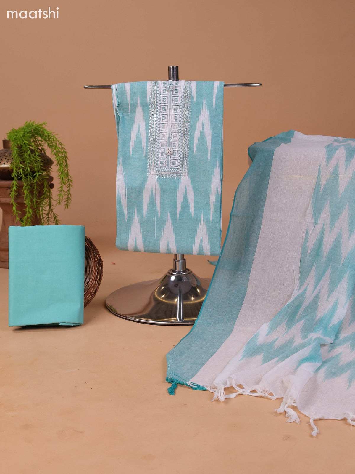 Pastel Green and Off White Cotton Dress Material With Ikat Weaves & Embroidery Work Neck Pattern and Bottom & Dupatta