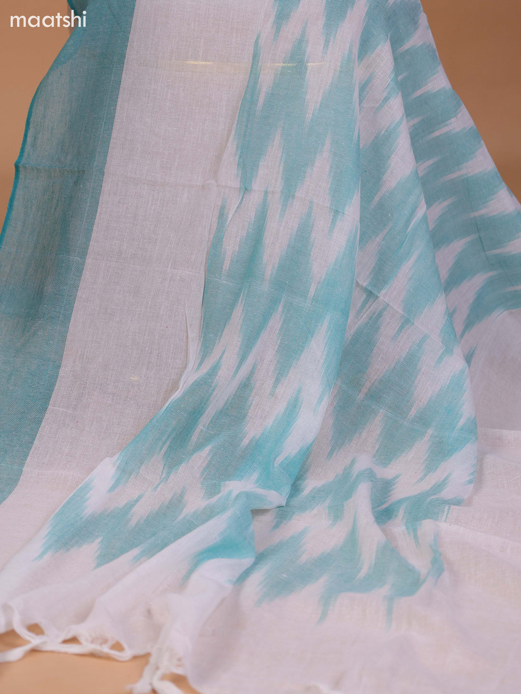 Pastel Green and Off White Cotton Dress Material With Ikat Weaves & Embroidery Work Neck Pattern and Bottom & Dupatta