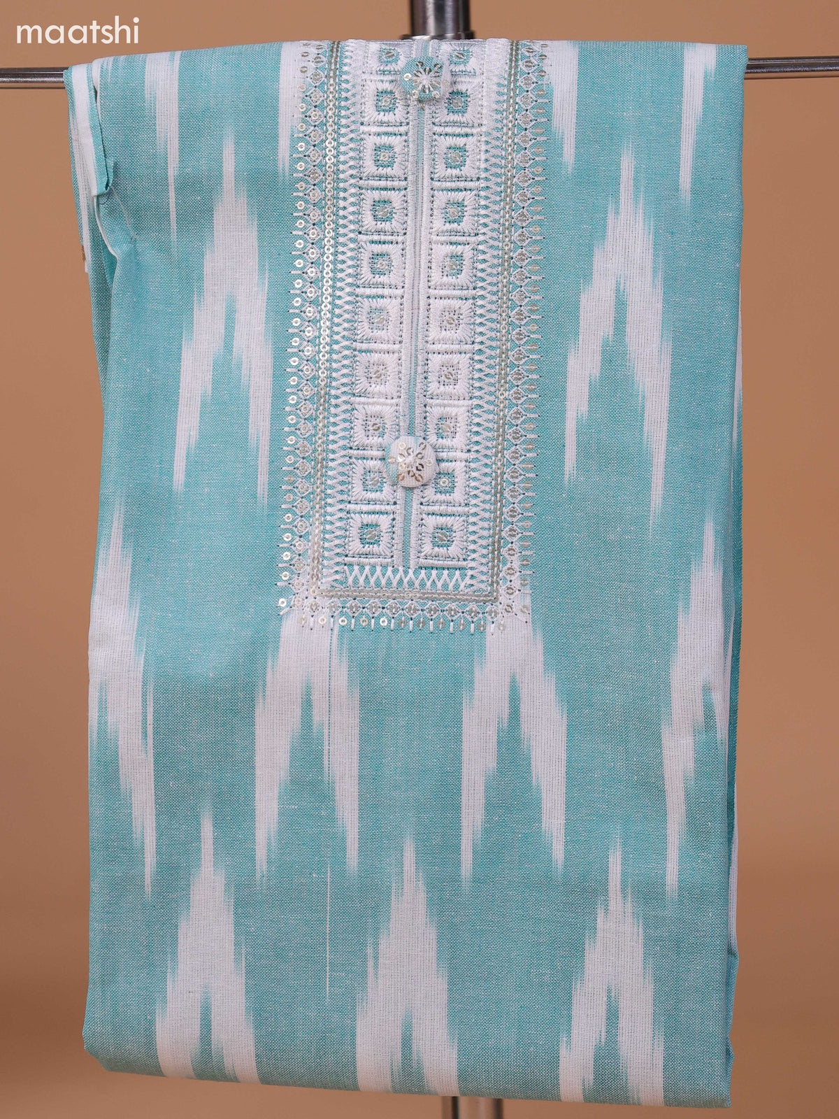 Pastel Green and Off White Cotton Dress Material With Ikat Weaves & Embroidery Work Neck Pattern and Bottom & Dupatta