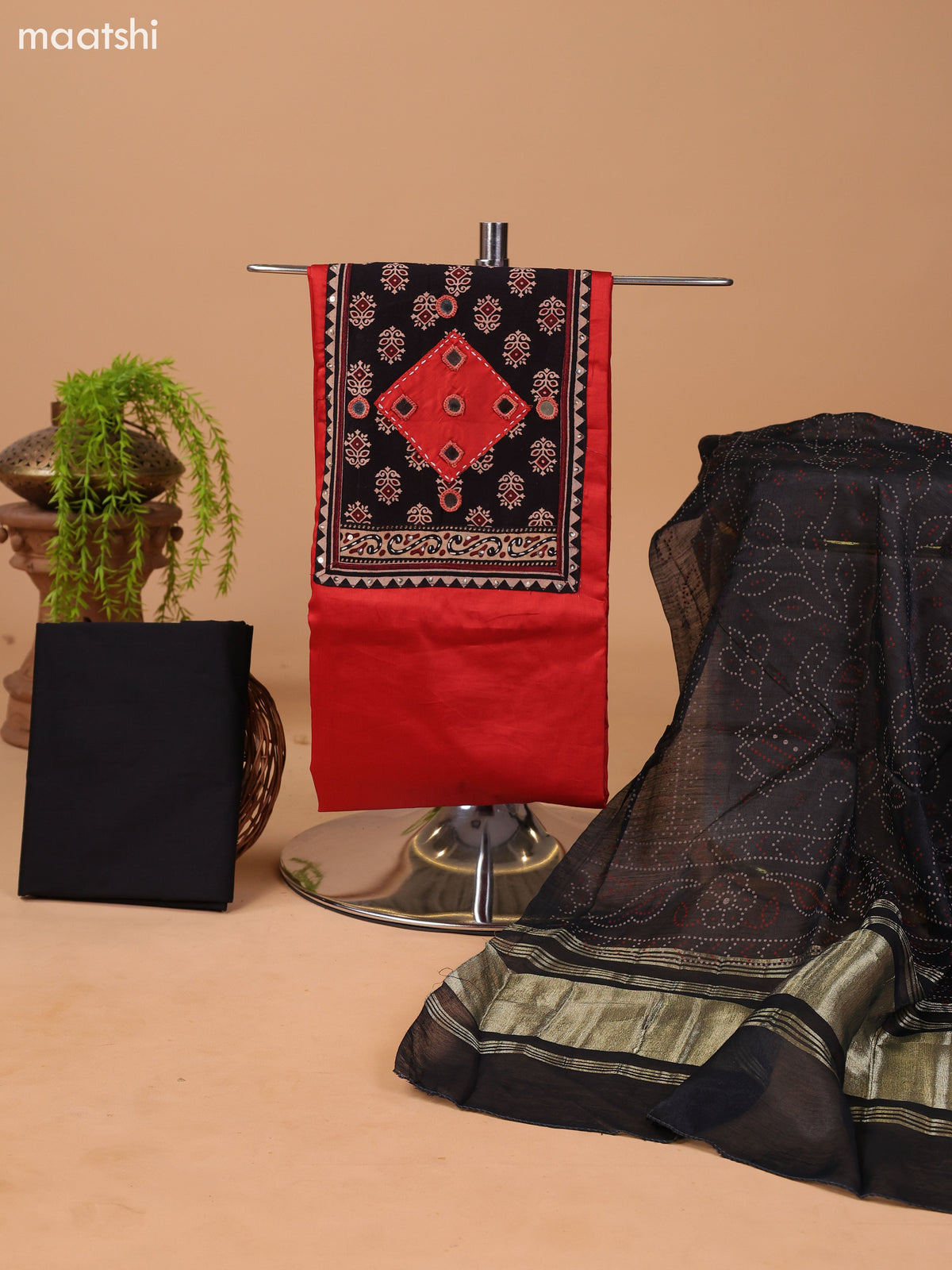 Rustic Orange and Black Cotton Dress Material With Plain Body & Patch Work Neck Pattern and Bottom & Bandhani Prints Dupatta