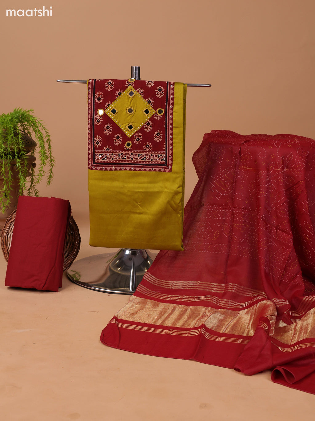 Mustard Green and Rust Cotton Dress Material With Plain Body & Patch Work Neck Pattern and Bottom & Bandhani Prints Dupatta