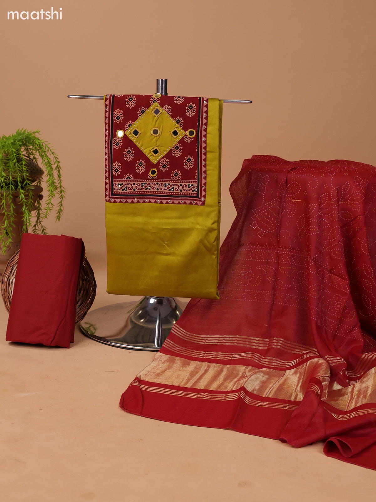 Mustard Green and Rust Cotton Dress Material With Plain Body & Patch Work Neck Pattern and Bottom & Bandhani Prints Dupatta