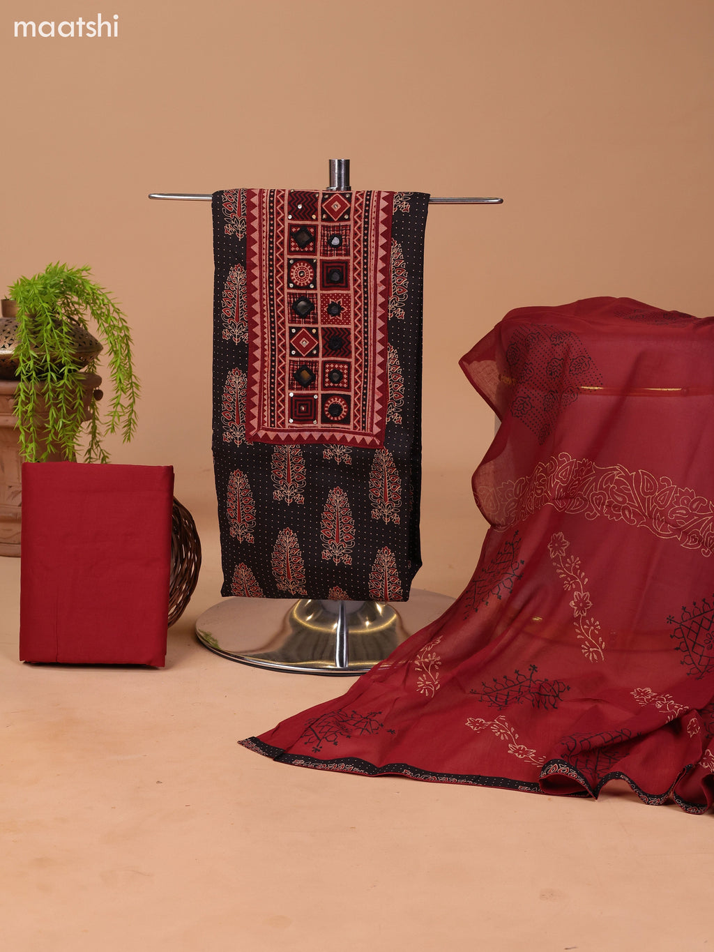 Black and Dark Rust Cotton Dress Material With Allover Prints & Embroidery Work Neck Pattern and Bottom & Dupatta