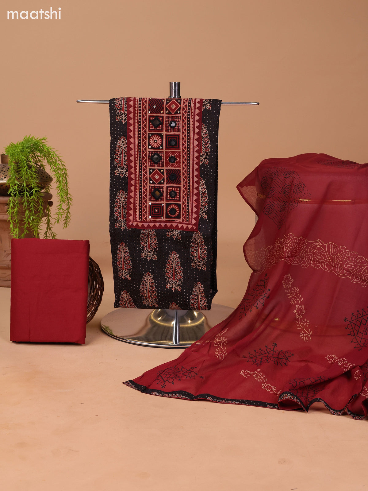 Black and Dark Rust Cotton Dress Material With Allover Prints & Embroidery Work Neck Pattern and Bottom & Dupatta
