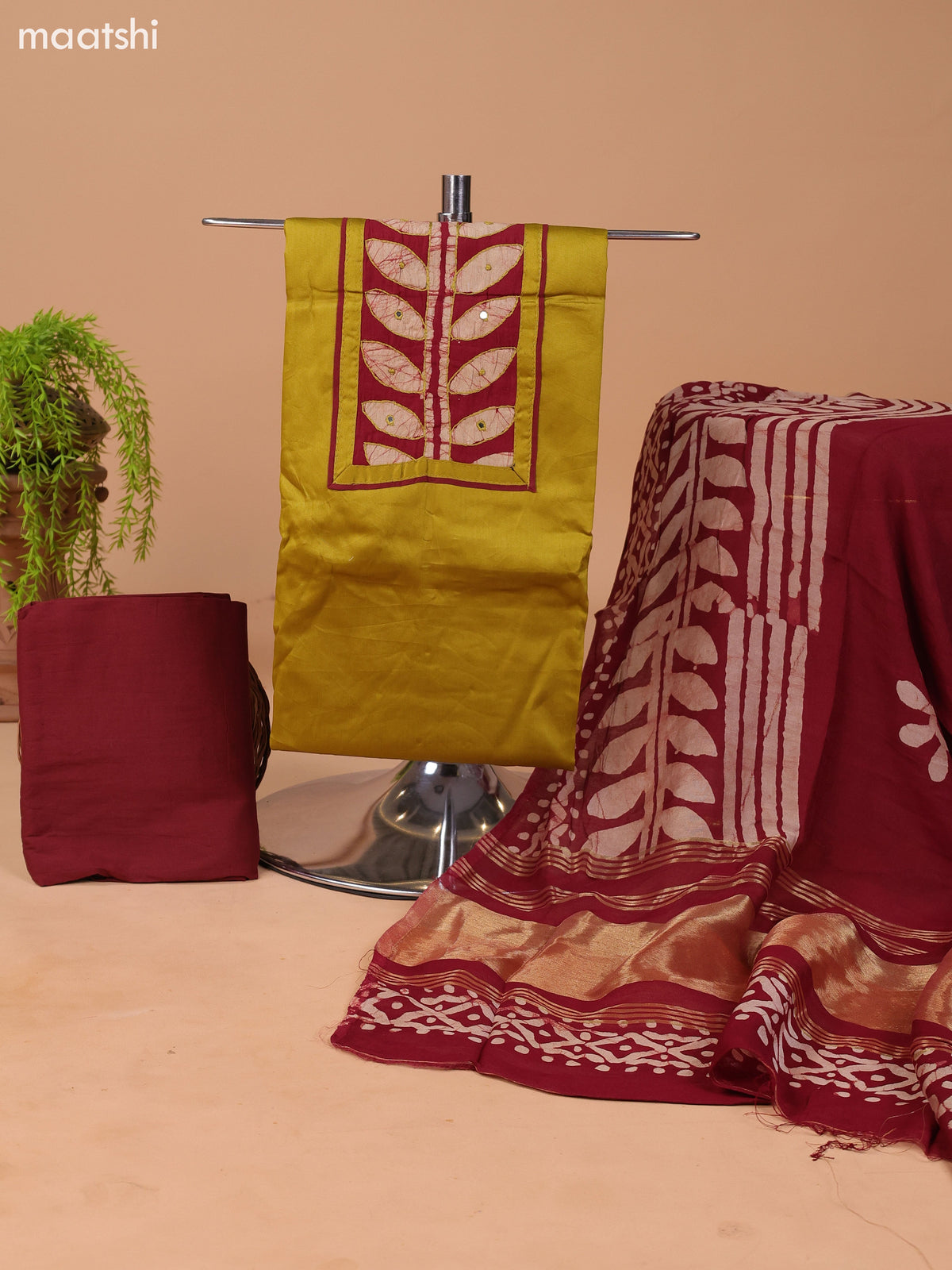Mustard Green and Maroon Cotton Dress Material With Plain Body & Batik Prints Patch Work Neck Pattern and Bottom & Dupatta