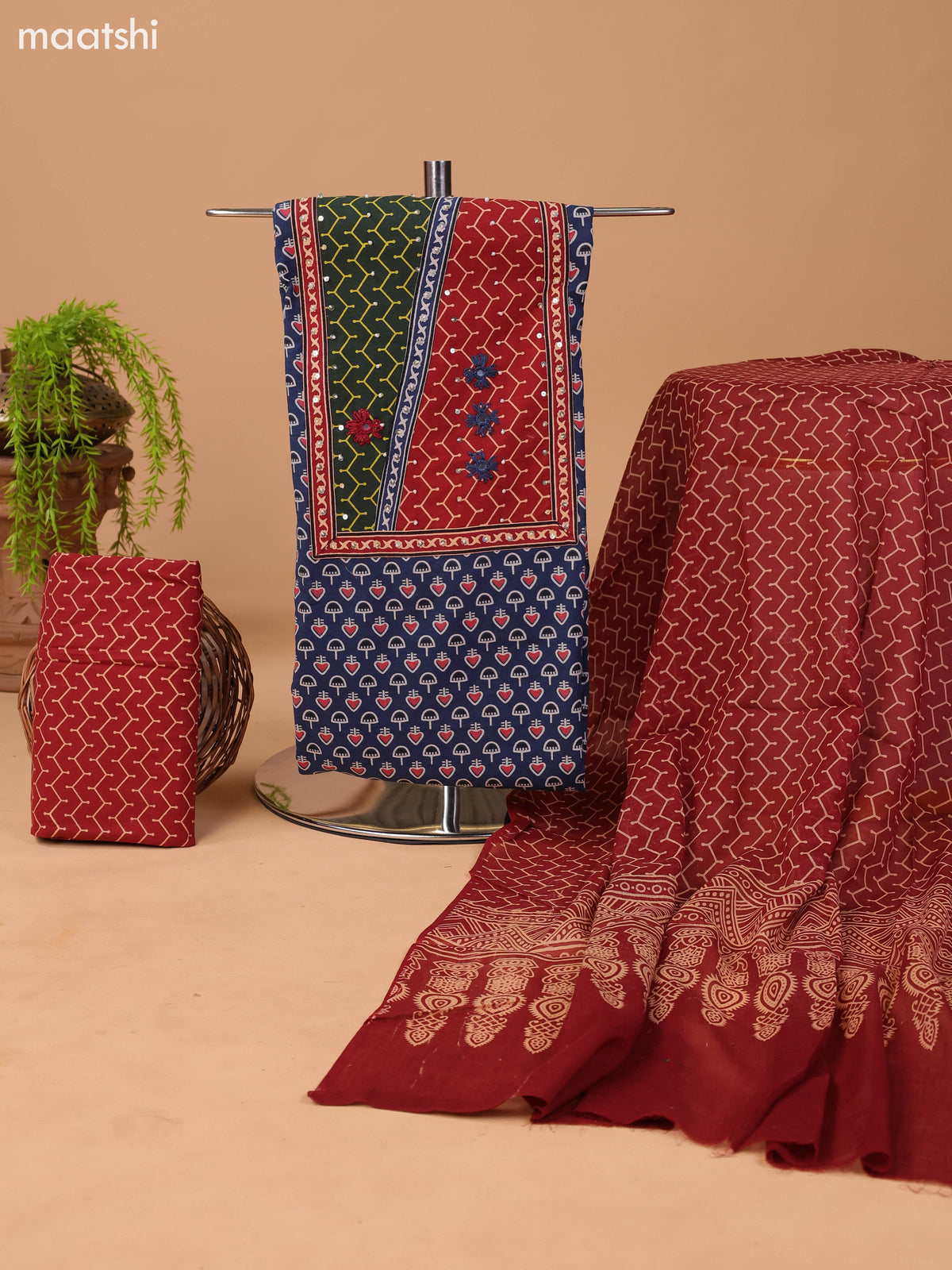 Navy Blue and Dark Rust Cotton Dress Material With Allover Prints & Embroidery Work Neck Pattern and Bottom & Dupatta