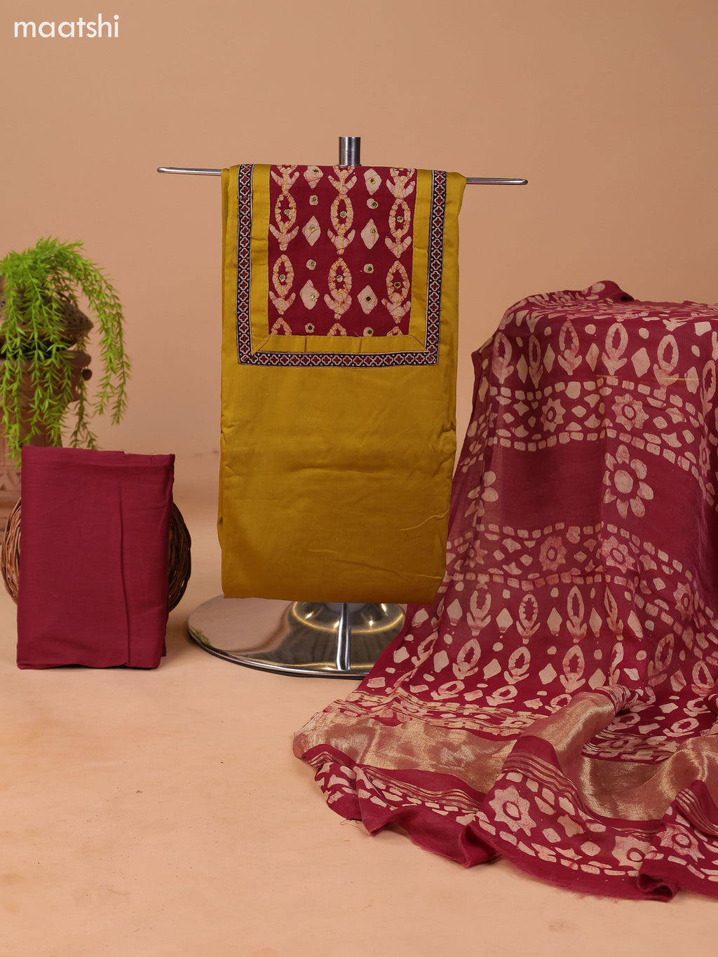 Mustard Green and Maroon Cotton Dress Material With Plain Body & Batik Prints Patch Work Neck Pattern and Bottom & Dupatta