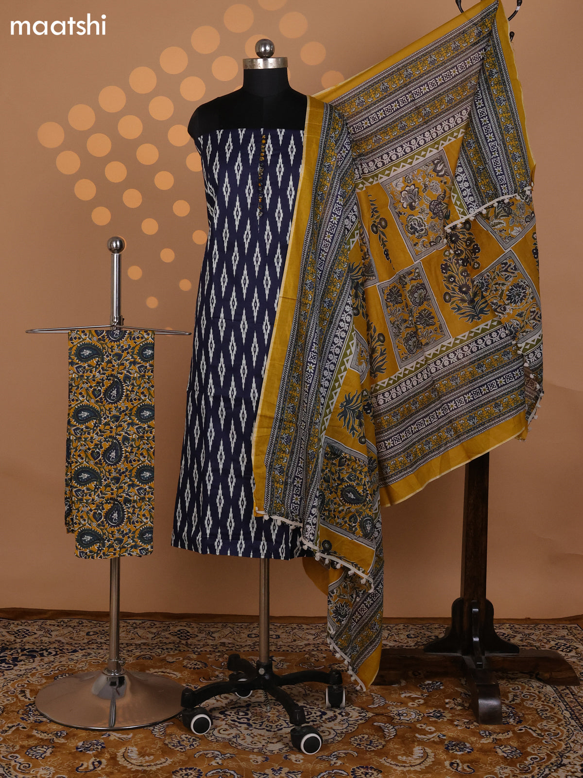 Navy Blue and Mustard Yellow Cotton Dress Material With Allover Ikat Weaves and Kalamkari Bottom & Dupatta