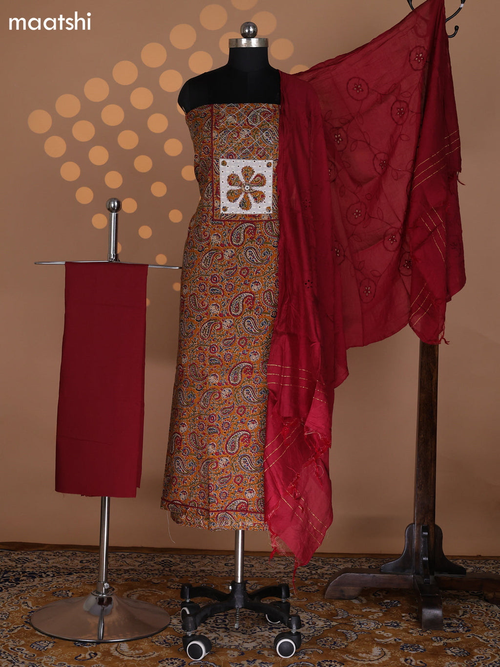 Dark Mustard and Maroon Cotton Dress Material With Allover Kalamkari Prints & Patch Work Neck Pattern and Bottom & Dupatta