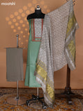 Pastel Green and Grey Cotton Dress Material With Plain Body & Embroidery Work Neck Pattern and Kalamkari Bottom & Dupatta