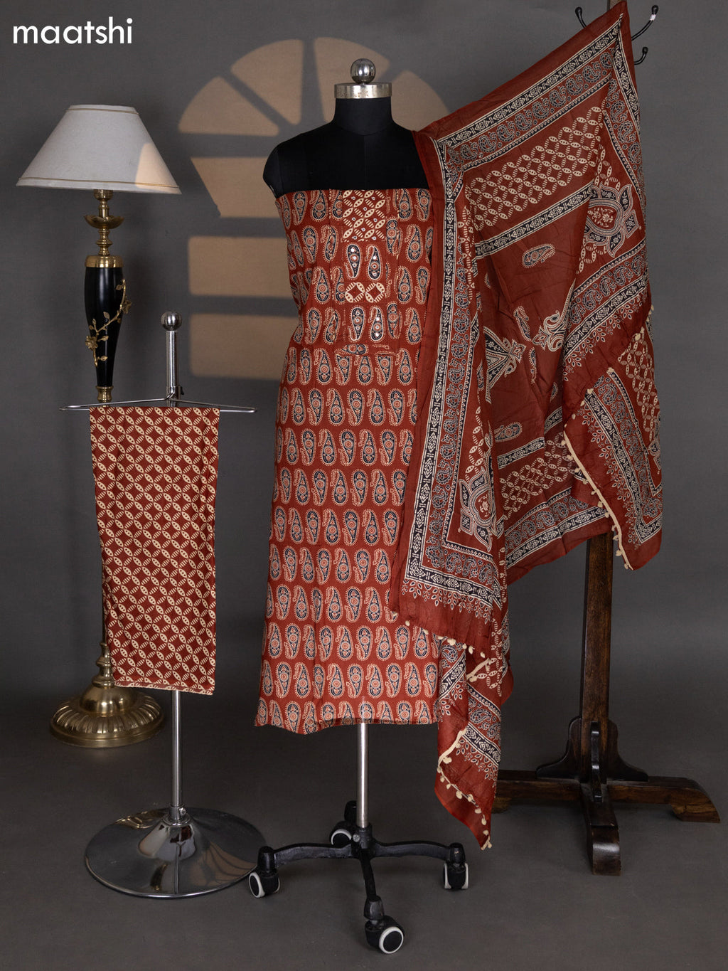 Dark Rust Cotton Dress Material With Allover Ajrakh Prints & Embroidery Work Neck Pattern and Bottom & Dupatta