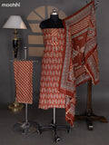 Dark Rust Cotton Dress Material With Allover Ajrakh Prints & Embroidery Work Neck Pattern and Bottom & Dupatta