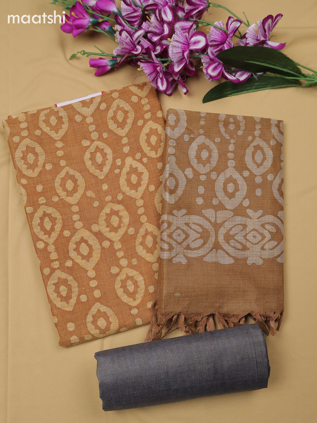 Pastel Brown Cotton Dress Material With Batik Prints & Simple Embroidery Work Neck Pattern