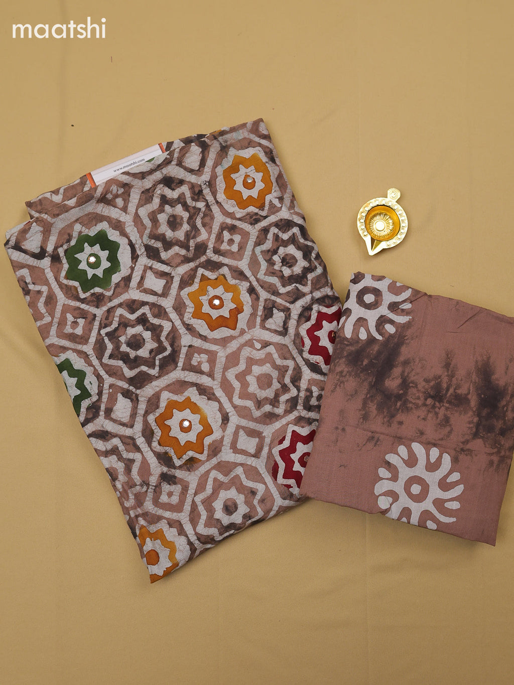 Off White and Pastel Brown Cotton Dress Material With Batik Prints & Simple Embroidery Work Neck Pattern