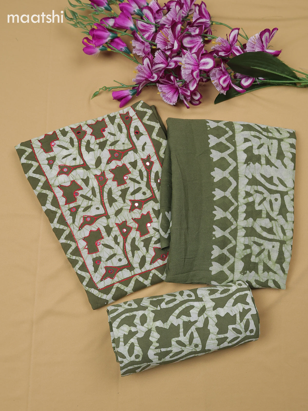 Green Cotton Dress Material With Batik Prints & Simple Embroidery Work Neck Pattern