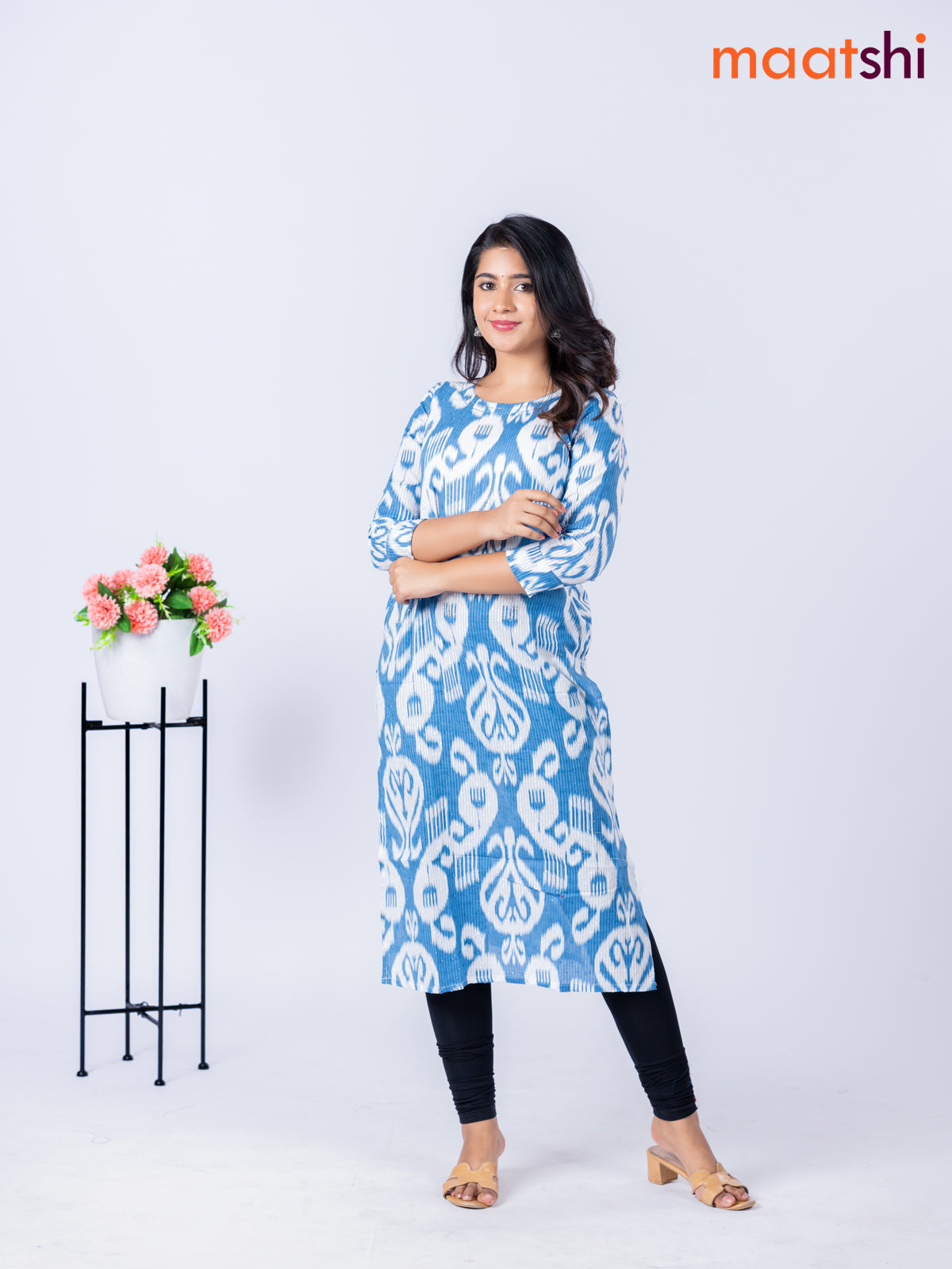 Cotton kurti with allover ikat weaves & beaded work neck pattern without pant
