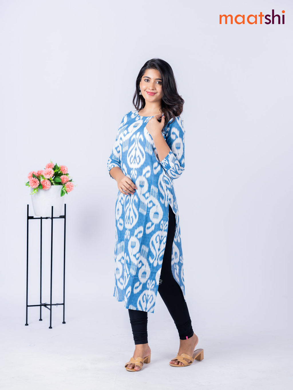 Cotton kurti blue and off white with allover ikat weaves & beaded work neck pattern without pant