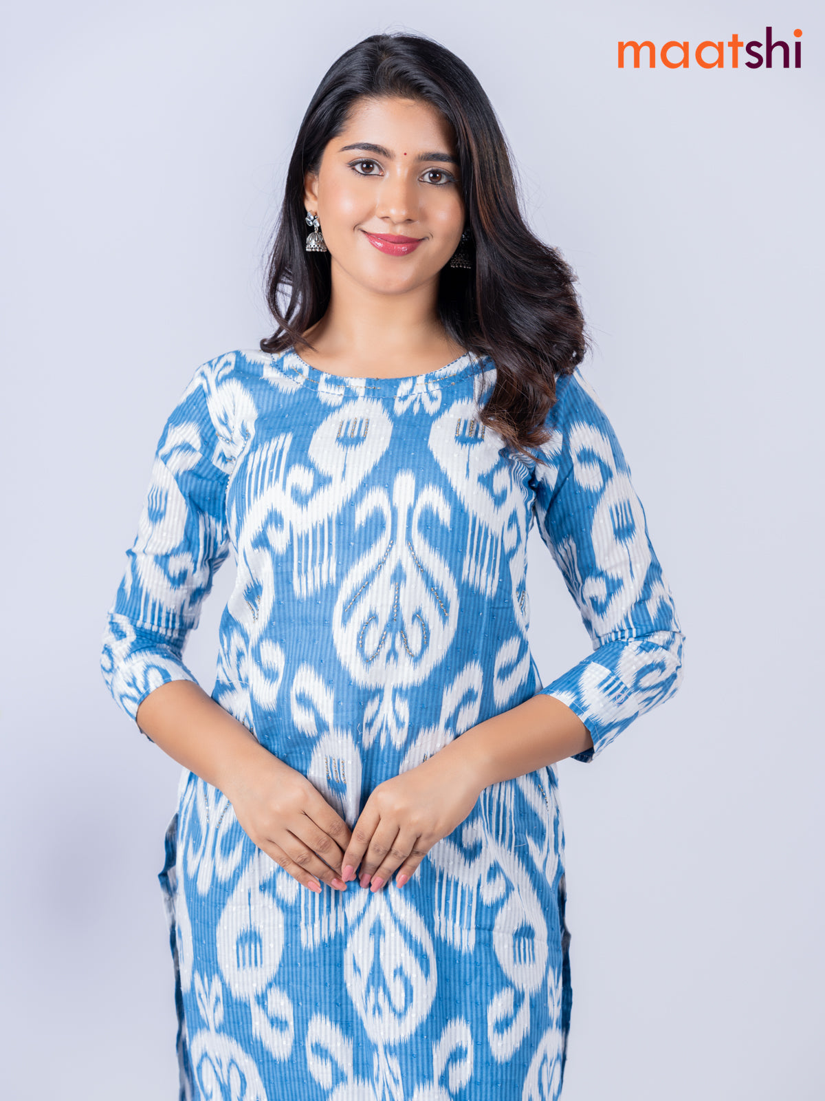 Cotton kurti blue and off white with allover ikat weaves & beaded work neck pattern without pant