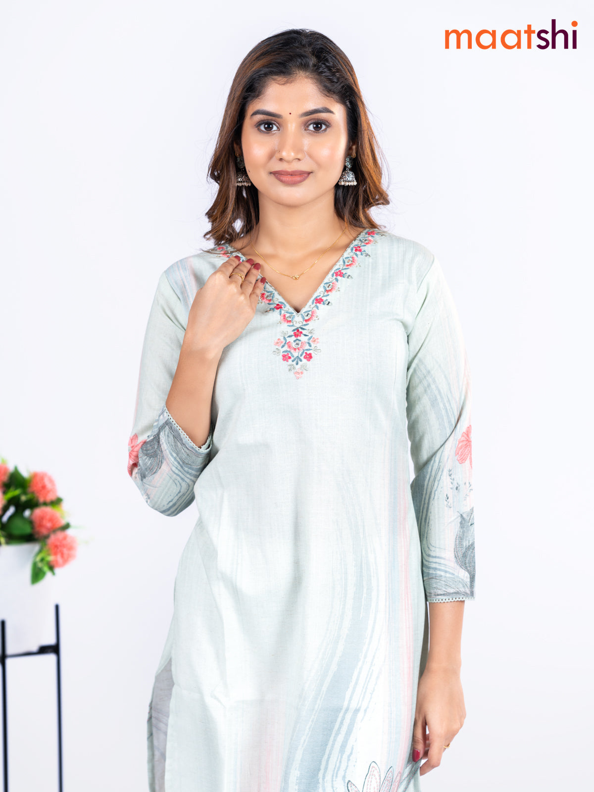 Cotton kurti mild pista green with allover floral prints & embroidery mirror work v neck pattern without pant