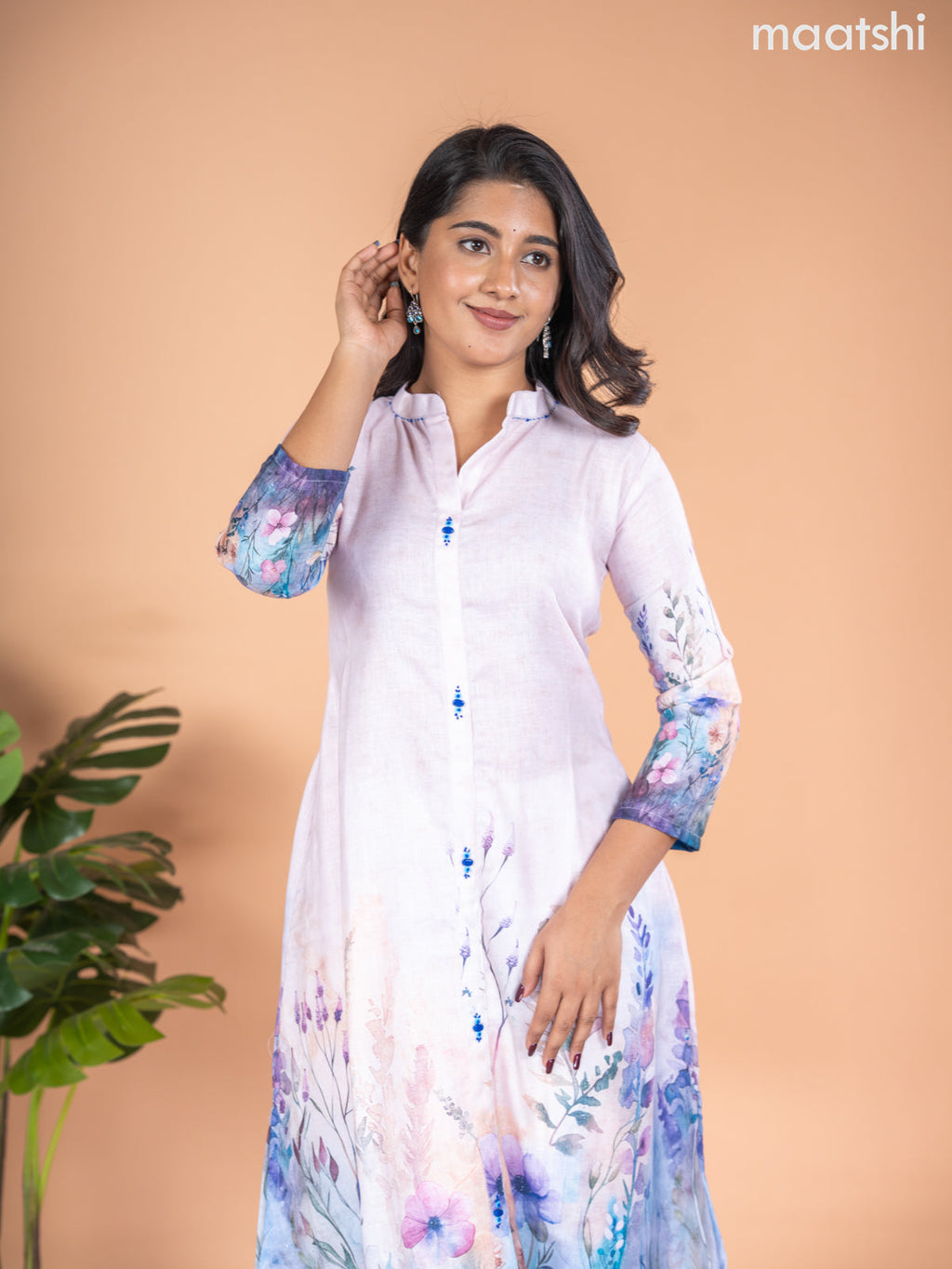 Rayon A-line kurti mild peach and multi colour with placement prints & simple neck pattern without pant
