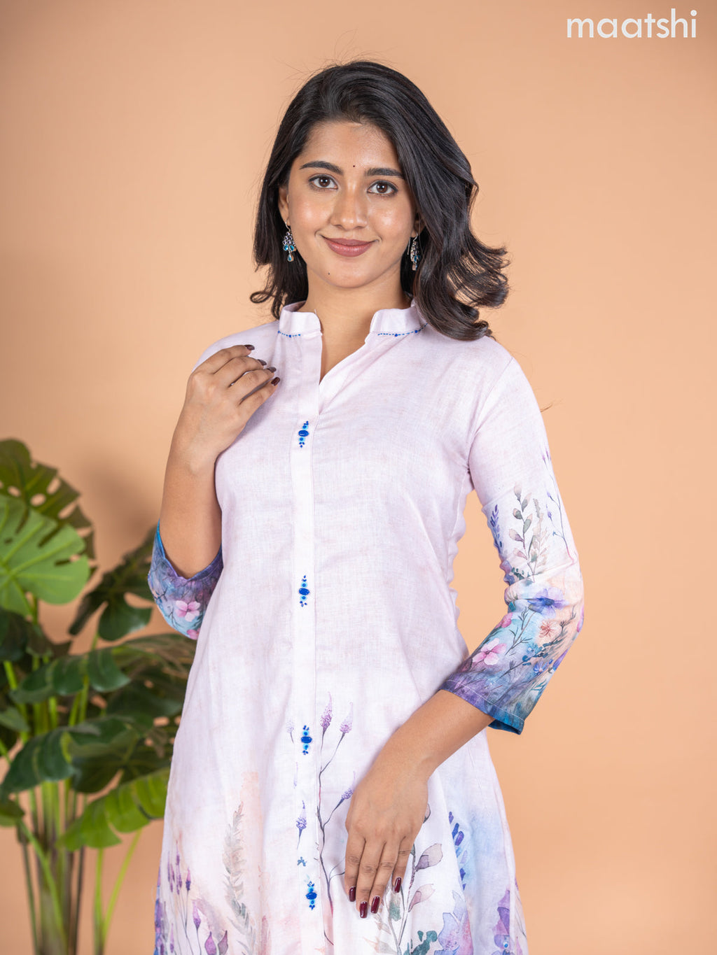 Rayon A-line kurti mild peach and multi colour with placement prints & simple neck pattern without pant