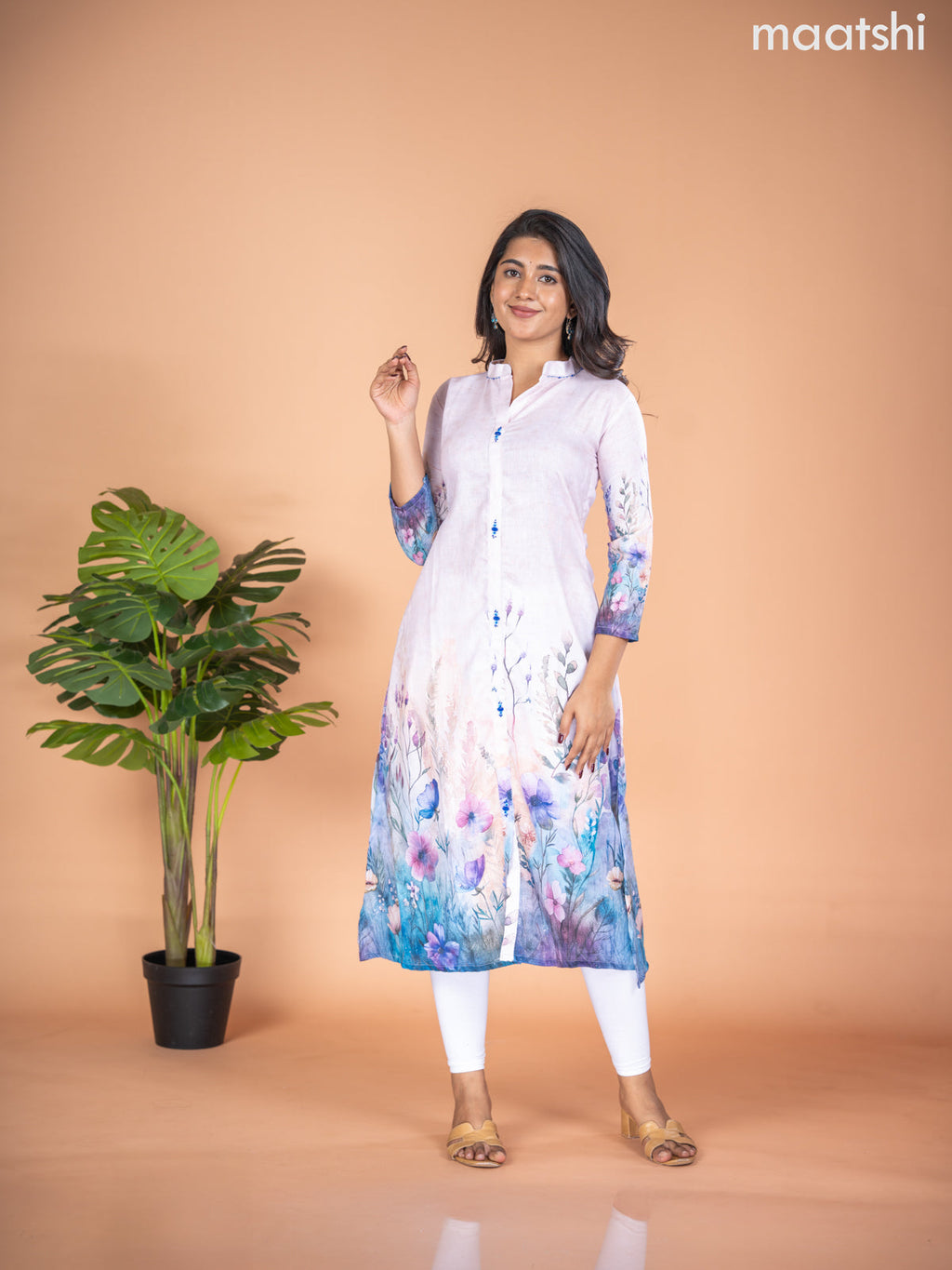 Rayon A-line kurti mild peach and multi colour with placement prints & simple neck pattern without pant