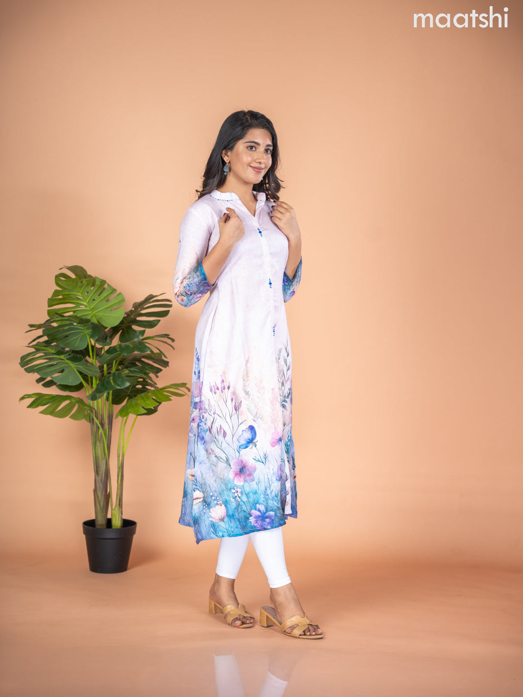Rayon A-line kurti mild peach and multi colour with placement prints & simple neck pattern without pant