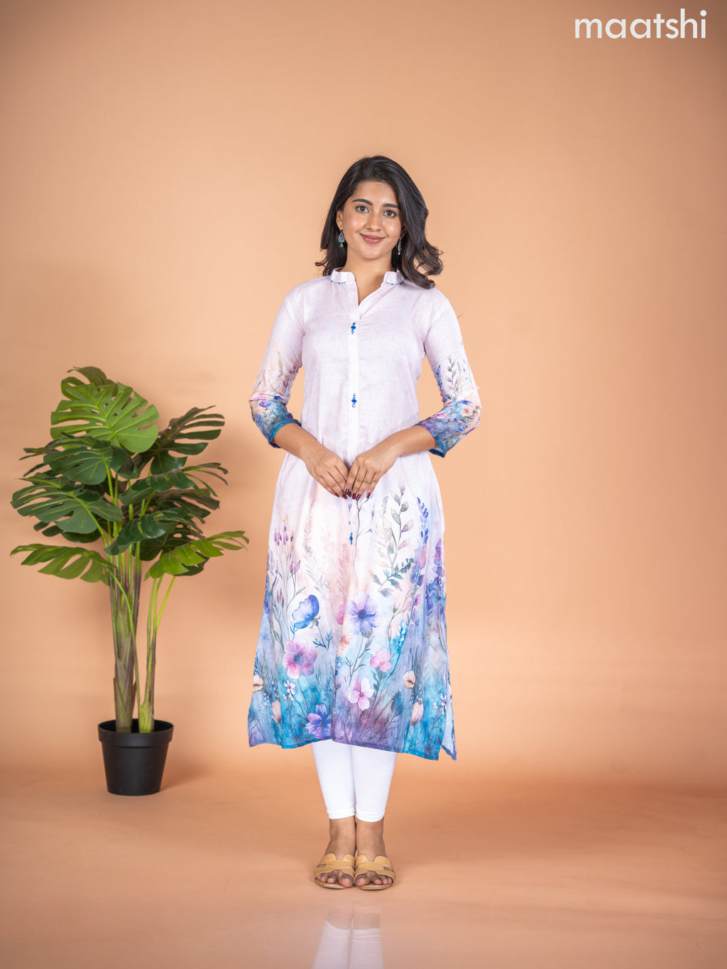 Rayon A-line kurti mild peach and multi colour with placement prints & simple neck pattern without pant