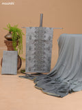 Greyish Green Cotton Dress Material With Floral Buttas & Embroidery Work Neck Pattern and Bottom & Dupatta