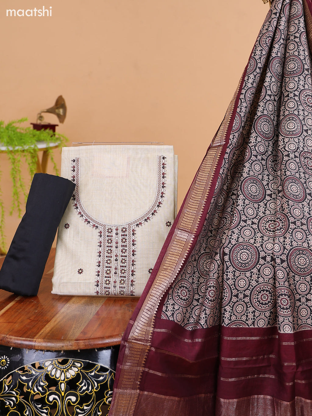 Off White and Black Cotton Dress Material With Floral Butta Prints & Embroidery Work Neck Pattern and Bottom & Dupatta