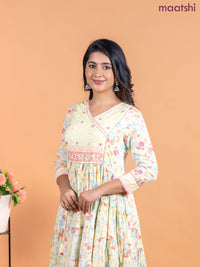 Cotton anarkali kurti pale yellow with allover prints & hakoba lace work neck pattern without pant