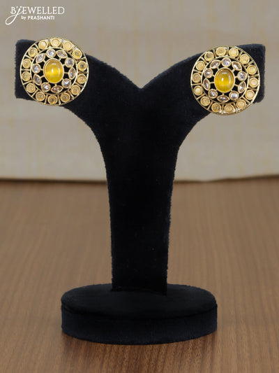 Light weight floral design earrings with yellow and white stones