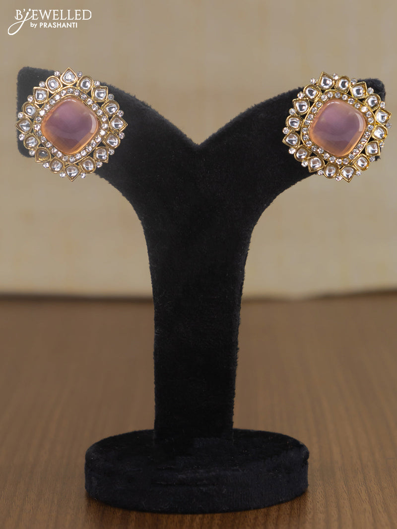 Light weight earrings with cz and baby pink stone