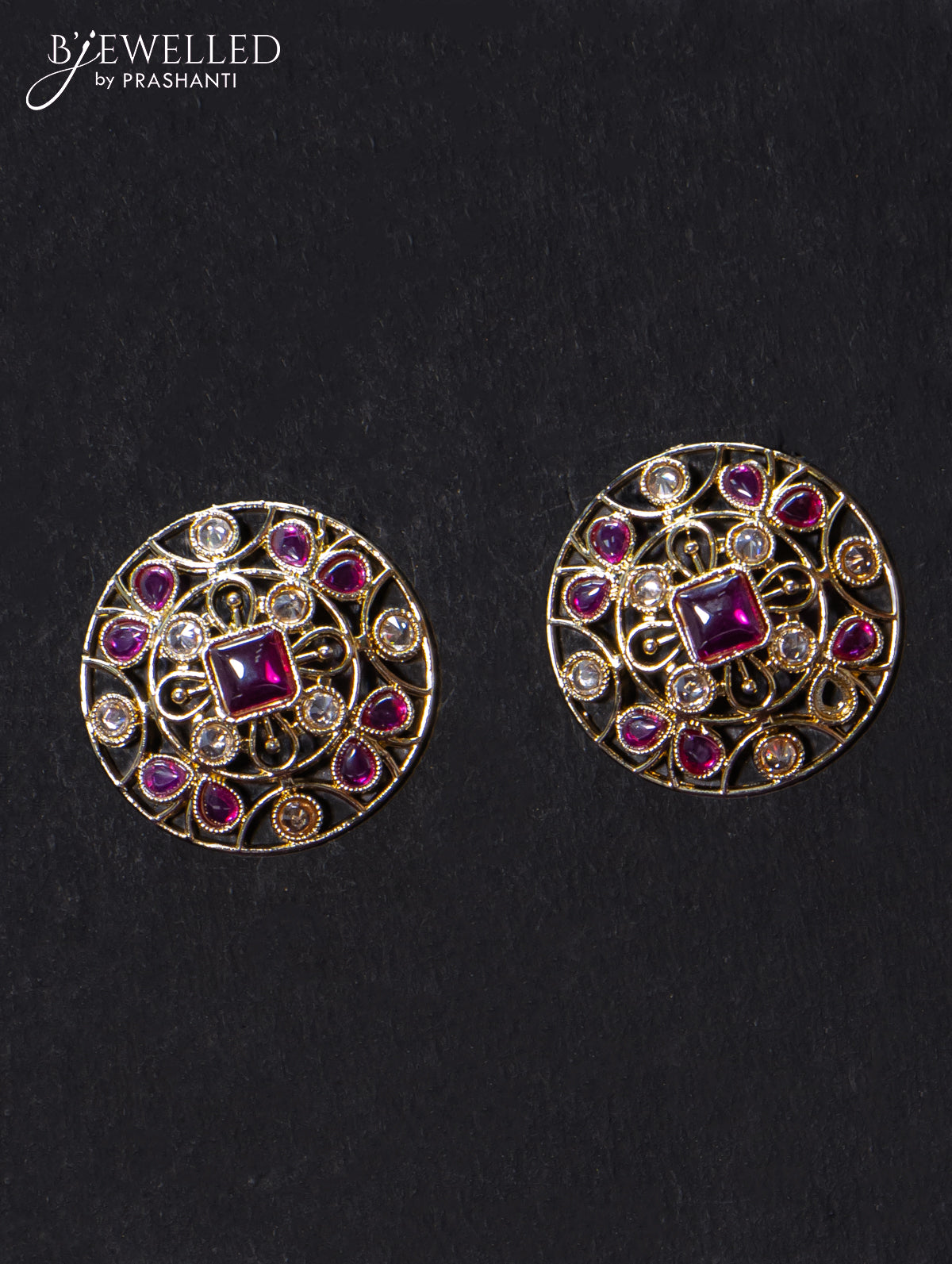 Light weight floral design earrings with cz and pink stone