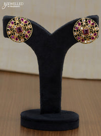 Light weight floral design earrings with cz and pink stone