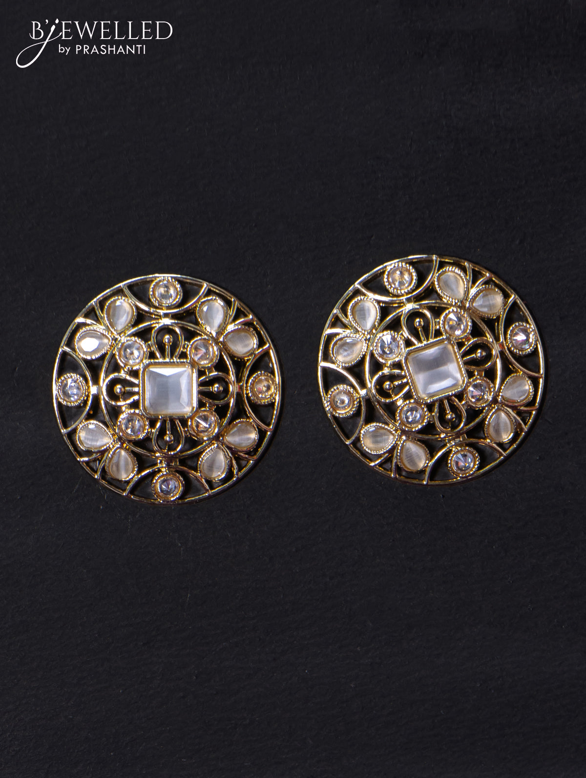 Light weight floral design earrings with cz and white stone